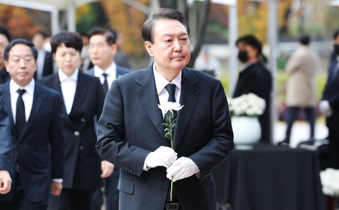 South Korean President Yoon Suk-yeol visits a memorial.