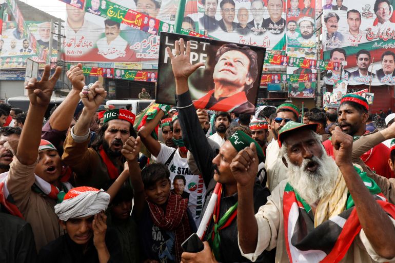 People chant slogans as they condemn the shooting incident on a long march held by Pakistan's former Prime Minister Imran Khan, in Wazirabad, Pakistan