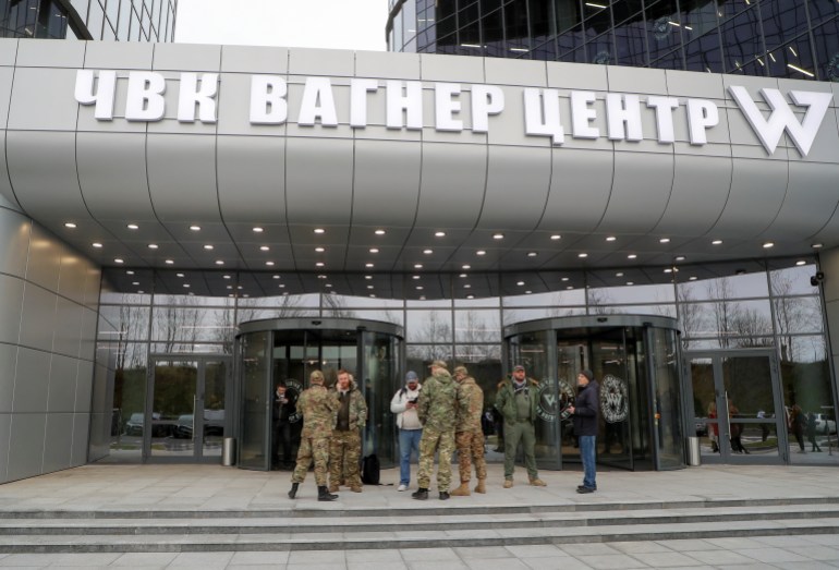 People gather outside PMC Wagner Centre, which is a project implemented by the businessman and founder of the Wagner private military group Yevgeny Prigozhin, during the official opening of the office block in Saint Petersburg, Russia, November 4, 2022.