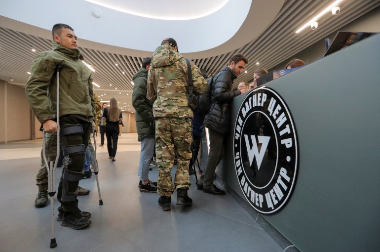People visit PMC Wagner Centre, which is a project implemented by the businessman and founder of the Wagner private military group Yevgeny Prigozhin, during the official opening of the office block in Saint Petersburg, Russia, November 4, 2022.