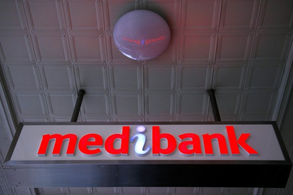 Medibank sign of red letters with white 'i'