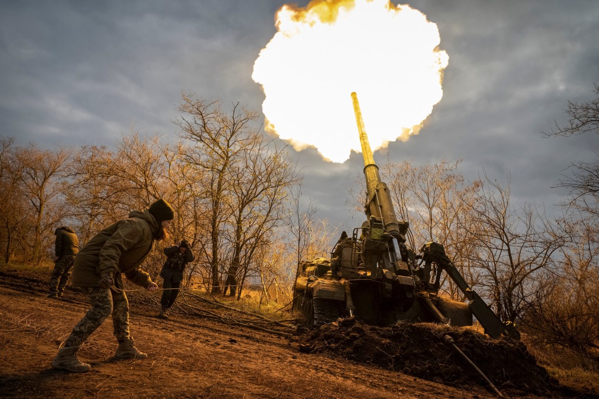 Ukrainian servicemen fire a self-propelled gun at a position on a frontline in Kherson region, Ukraine.