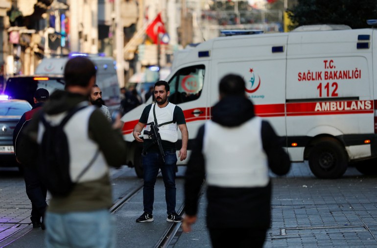 Ambulances and security is seen after an explosion on busy pedestrian Istiklal street in Istanbul.
