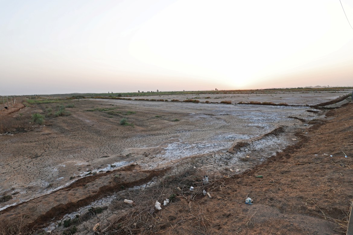 Salt residue is seen on arid farmland in al-Muthanna Province, Iraq