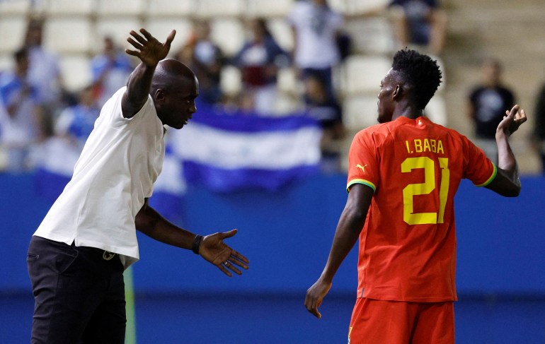 Ghana coach Otto Addo gives instructions to Iddrisu Baba at Francisco Artes Carrasco Stadium, Lorca, Spain - September 27, 2022.