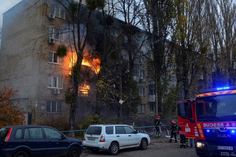Building in Kyiv in fire after it was struck by a Russian missile.