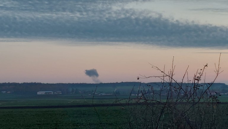 Smoke rises in the distance, amid reports of two explosions, seen from Nowosiolki, Poland, near the border with Ukraine November 15, 2022 in this image obtained from social media.