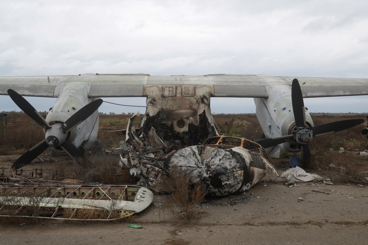 A view shows a destroyed Antonov An-24 aircraft