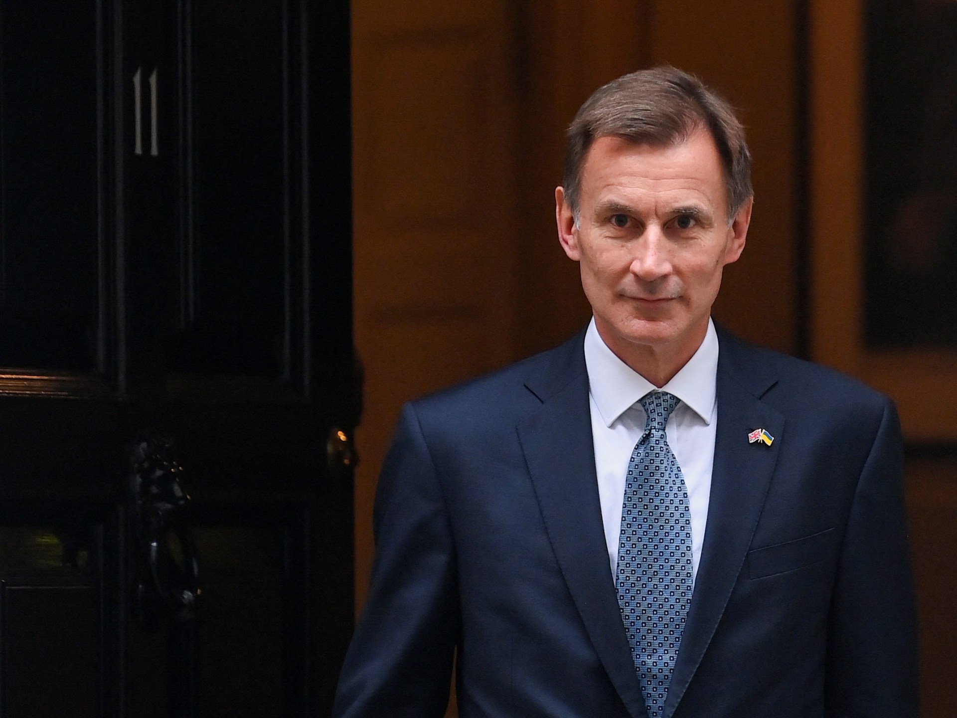 Hunt unveils new spending cuts, tax hikes to fix UK’s economy
