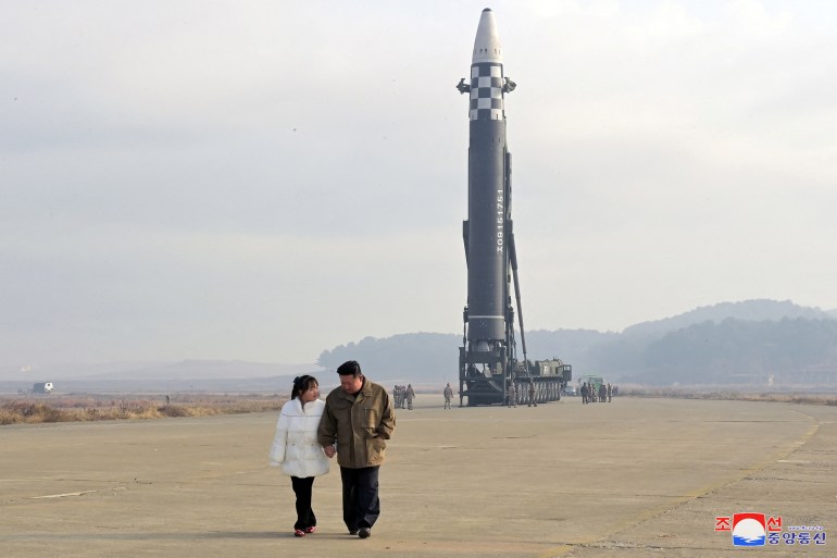 North Korean leader Kim Jong Un walks away from an intercontinental ballistic missile (ICBM) in this undated photo released on November 19, 2022 by North Korea's Korean Central News Agency (KCNA). KCNA via REUTERS ATTENTION EDITORS - THIS IMAGE WAS PROVIDED BY A THIRD PARTY. NO THIRD PARTY SALES. SOUTH KOREA OUT. NO COMMERCIAL OR EDITORIAL SALES IN SOUTH KOREA. REUTERS IS UNABLE TO INDEPENDENTLY VERIFY THIS IMAGE.