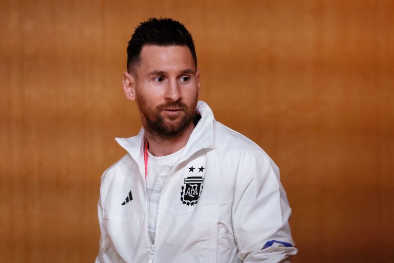 Argentina's Lionel Messi walks out ahead of the press conference