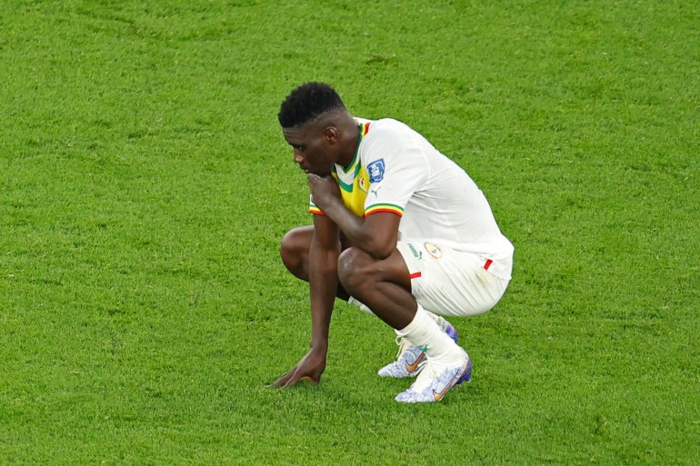 Senegal's Ismaila Sarr looks dejected after the loss to Netherlands