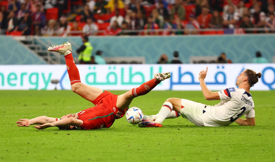Tim Ream of the U.S. fouls Wales' Gareth Bale to concede a penalty