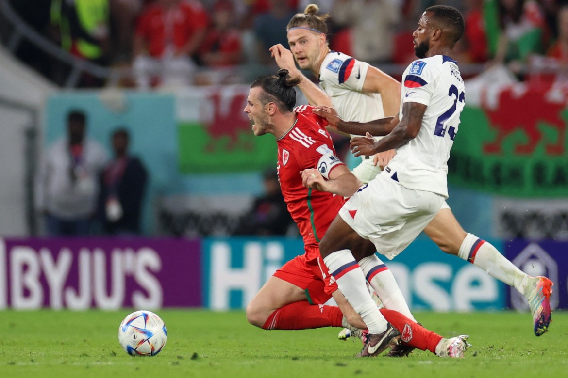 Wales' Gareth Bale is fouled by Kellyn Acosta
