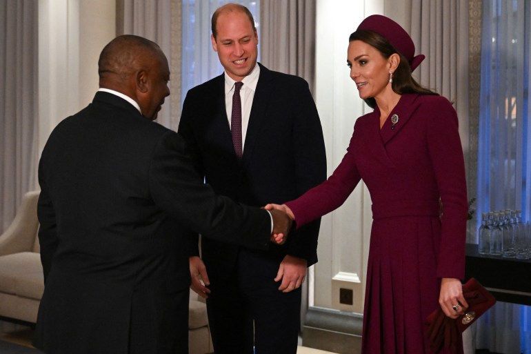 Britain's Prince William, Prince of Wales, and his wife Britain's Catherine, Princess of Wales, greet South Africa's President Cyril Ramaphosa in London