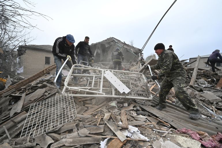 Rescuers work at the site of a maternity ward of a hospital destroyed by a Russian missile attack, as their attack on Ukraine continues, in Vilniansk, Ukraine