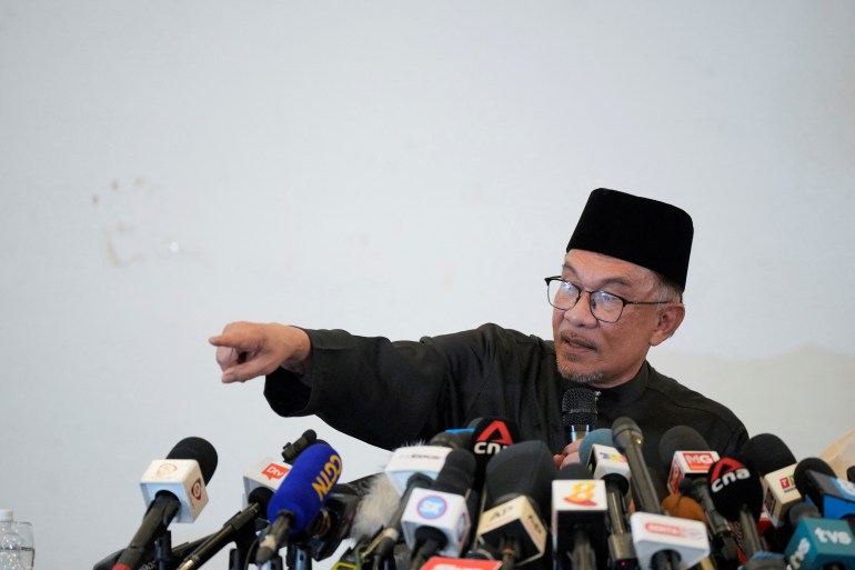 Malaysia’s Anwar starts work promising inclusive government