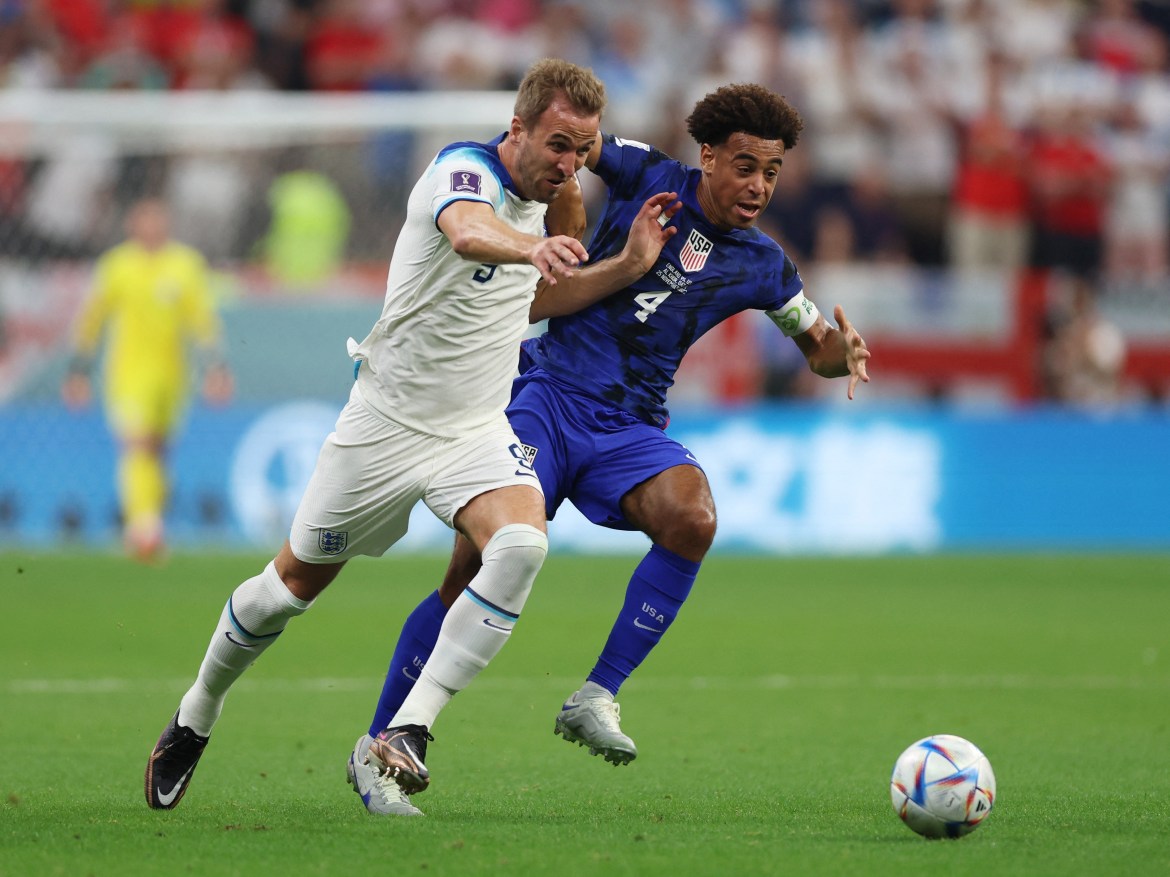 England's Harry Kane in action with Tyler Adams
