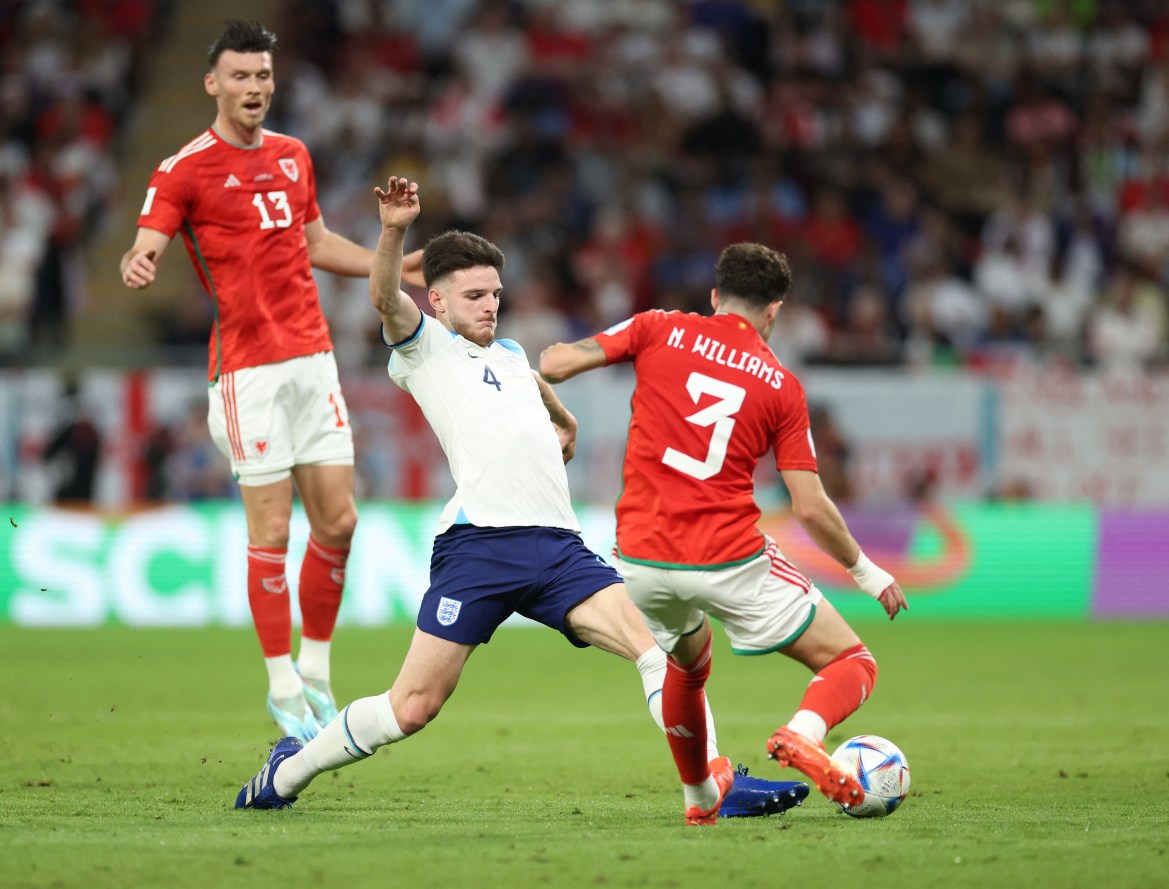 England's Declan Rice in action with Wales' Neco Williams