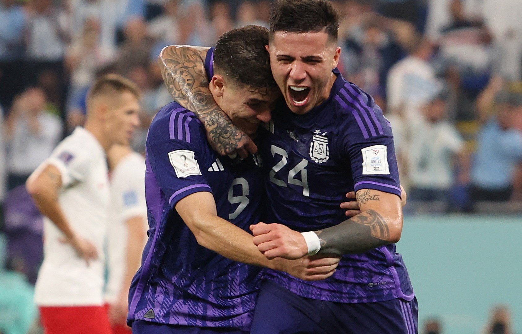 Argentina coast past Poland 2-0 to top World Cup Group C
