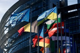 The Ukrainian flag, centre right, outside the European Parliament before a commission on Russia&#39;s escalation of its war of aggression against Ukraine, October 5, 2022, Strasbourg, France [File: Jean-Francois Badias/AP Photo]