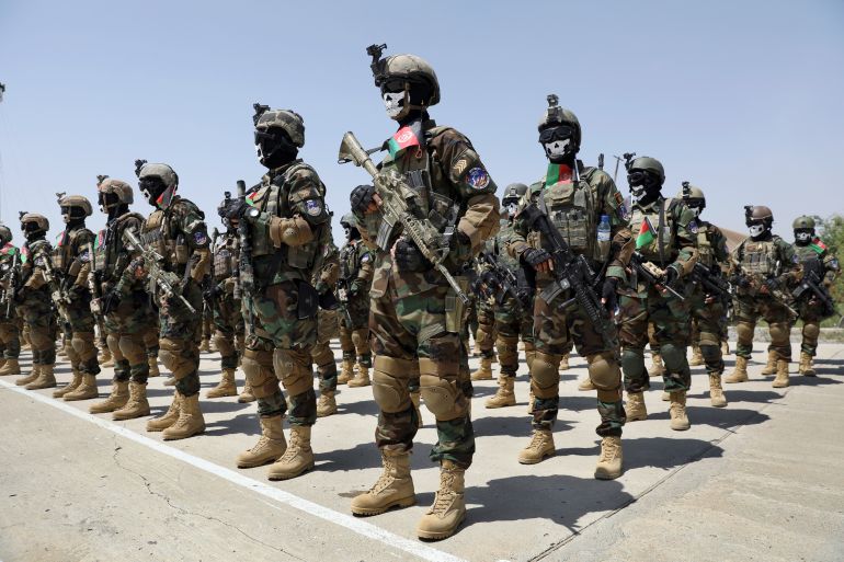 New Afghan Army special forces members, in formation, attend their graduation ceremony at the Kabul Military Training Center in Kabul, Afghanistan.
