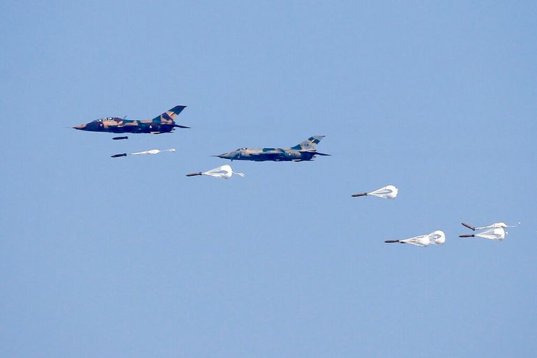 Myanmar Air Force Jet fighters drop bombs during military exercises in 2018, in the Ayeyarwaddy delta region, Myanmar [File: Lynn Bo Bo/pool/AP]