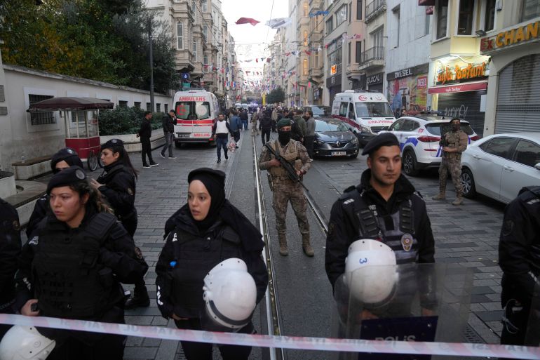 Security and ambulances at the scene after an explosion on Istanbul's popular pedestrian Istiklal Avenue.