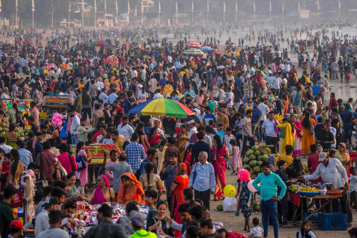 People crowd at the Juhu beach on the Arabian Sea