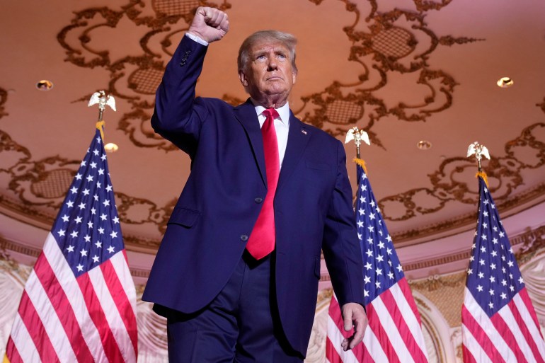 Donald Trump raises his fists at Mar-a-Lago as he announces his 2024 presidential bid