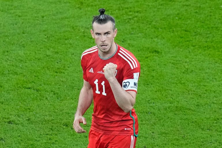 Wales's Gareth Bale celebrates after scoring his team's first goal during the World Cup, group B football match between the United States and Wales.