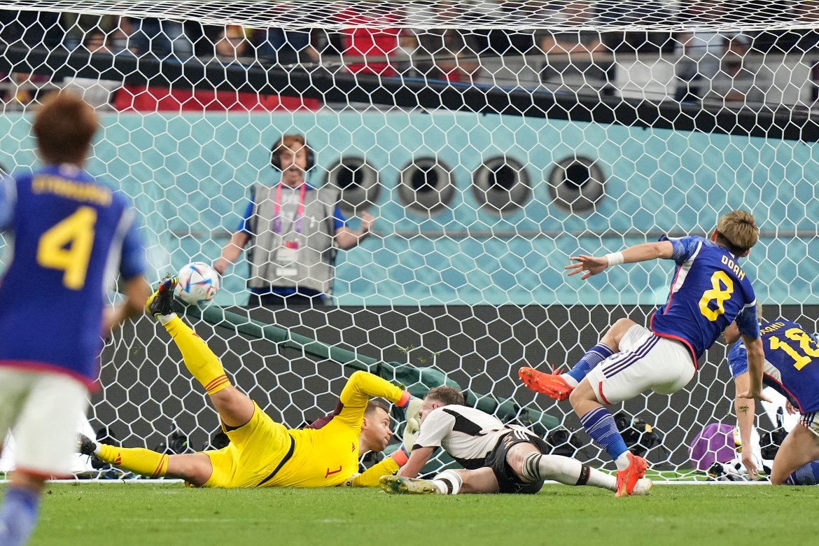 Photos: Japan get late goals to beat Germany 2-1 at World Cup | In Pictures  | Al Jazeera