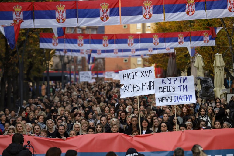Serbian women march in the northern part of Kosovska Mitrovica, Kosovo,