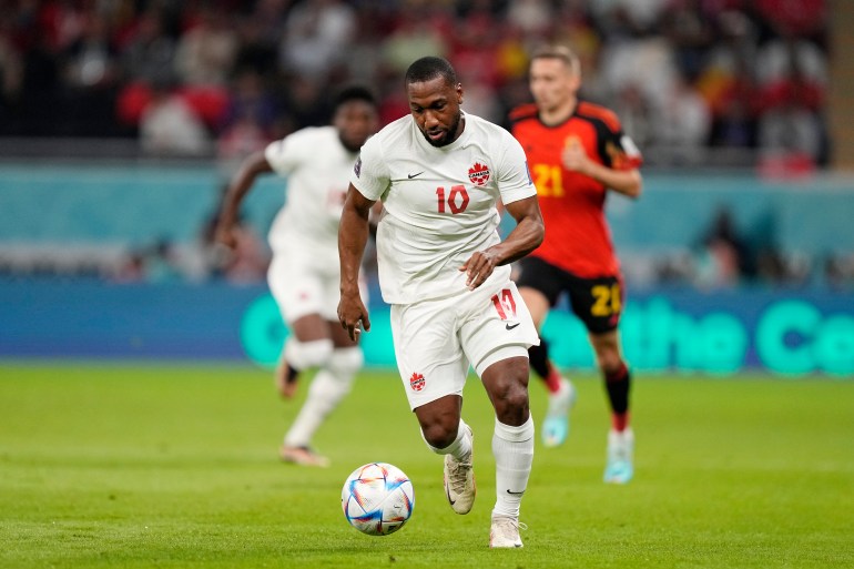 Canada's Junior Hoilett controls the ball during the World Cup group F soccer match between Belgium and Canada, at the Ahmad Bin Ali Stadium in Doha, Qatar, Wednesday, Nov. 23, 2022. (AP Photo/Martin Meissner)