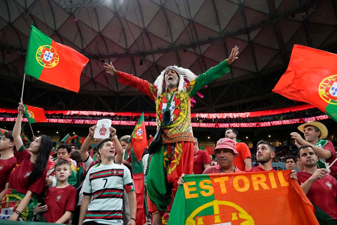 Fans cheer before the World Cup match between Portugal and Uruguay.
