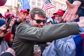 FILE- Nick Fuentes right-wing podcaster, center, greets supporters before speaking at a pro-Trump march, Nov. 14, 2020, in Washington. Former President Donald Trump had dinner Tuesday, Nov. 22, 2022, at his Mar-a-Lago club with the rapper formerly known as Kanye West, who is now known as Ye, as well as Nick Fuentes, who has used his online platform to spew antisemitic and white supremacist rhetoric. (AP Photo/Jacquelyn Martin, File)