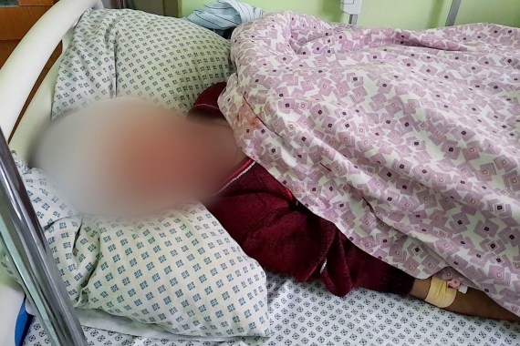 A wounded boy receives treatment at a hospital after a deadly bomb in Samangan province.
