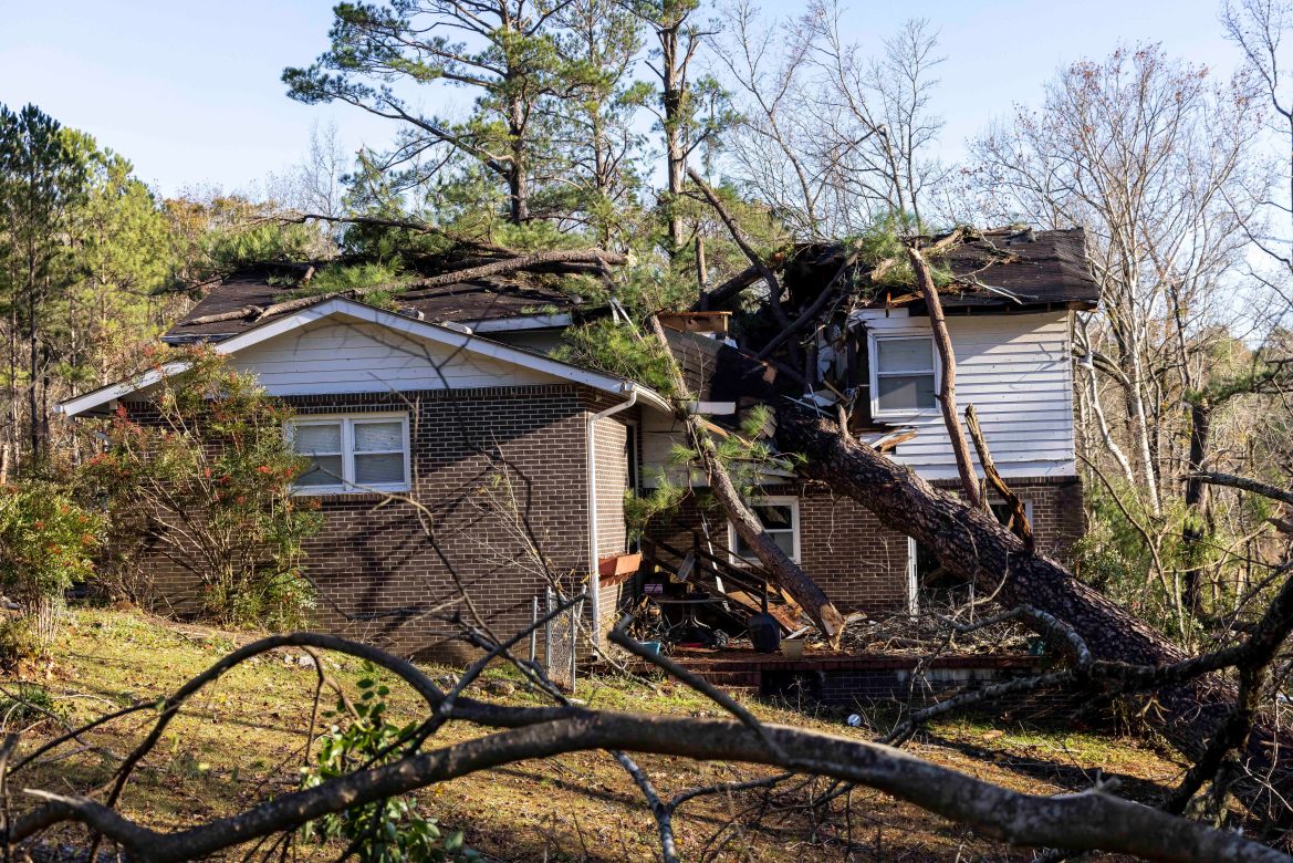 Wes Garner's residence is damaged by fallen trees