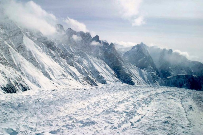 FILE - This Feb. 1, 2005 file photo shows an aerial view of the Siachen Glacier, which traverses the Himalayan region dividing India and Pakistan, about 750 kilometers (469 miles) northwest of Jammu, India. An avalanche hit the Siachen Glacier in the Indian-controlled portion of Kashmir early Wednesday,Feb.3, 2016 trapping 10 Indian army soldiers in the snow. 
