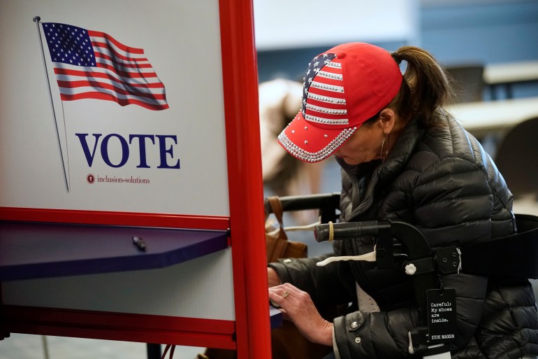 Voters cast their ballots at the Utah County Justice and Health center.