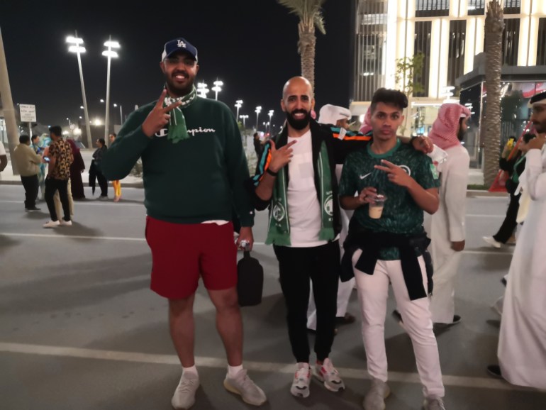 Qatari boys celebrate Saudi Arabia's win