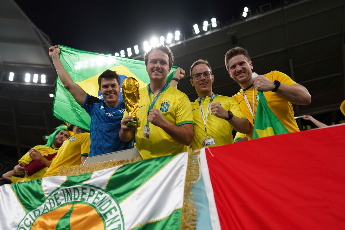 Brazil fans celebrating in the stands before the match