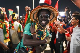 Senegal fans celebrating their victory over host-nation Qatar on November 25, 2022.