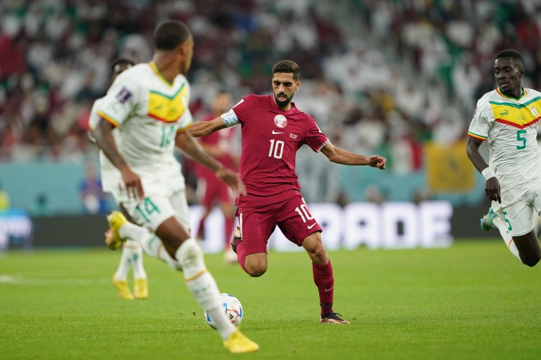 Qatar's Hassan Al-Haydos controls the ball. | Qatar v Senegal, Group A, FIFA World Cup 2022, November 25, Al Thumama Stadium in Doha, Qatar [Sorin Furcoi/Al Jazeera]