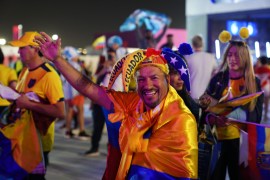 Ecuador fans celebrate outside Al Bayt stadium