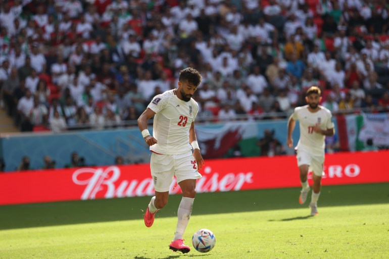 Ramin Rezaeian and Ali Gholizadeh during the match between Iran and Wales at the FIFA World Cup Qatar 2022. 