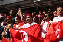 Tunisian fans will hope to inspire their side to a historic win over France in their final Group D game at the 2022 World Cup [Showkat Shafi/Al Jazeera]