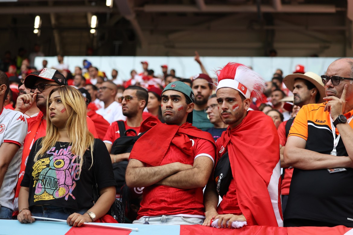 Tunisian fans sad while watching the match.