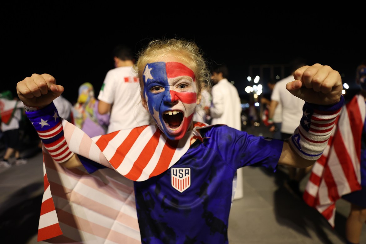 A USA fand celebrating outside the stadium before the match
