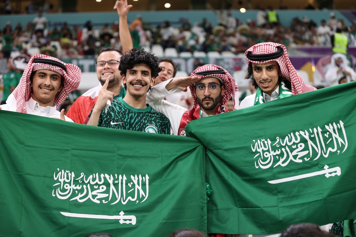 Saudi Arabia fans celebrate in the stands before the match